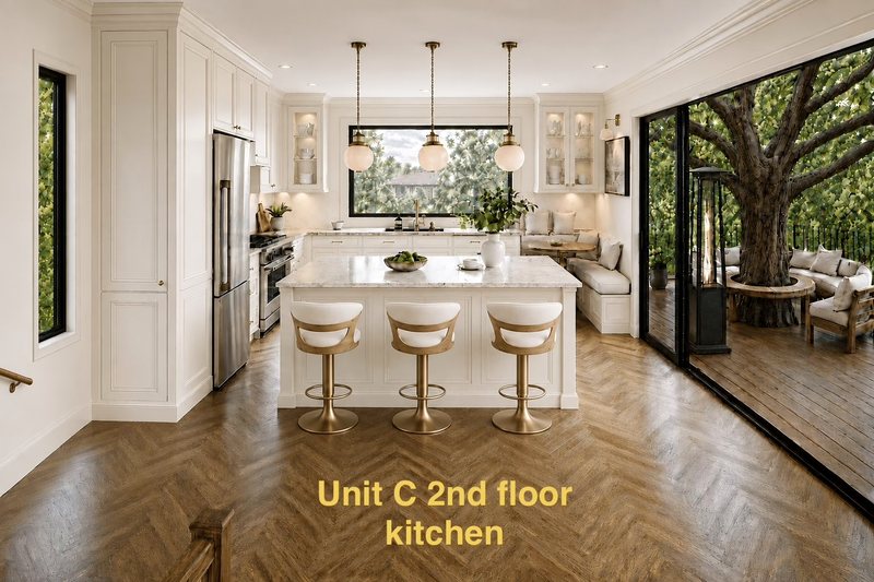 Unit C second-floor kitchen with marble island and tree deck