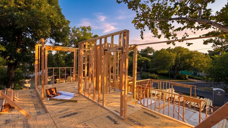 Second-floor deck and wall framing at 1708 Collier, August 2026