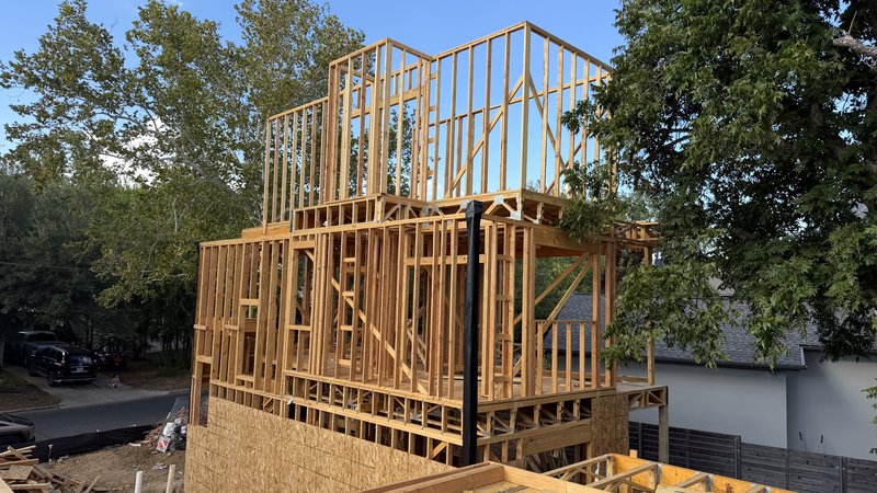 Three-story frame seen from the neighboring framed deck, September 7