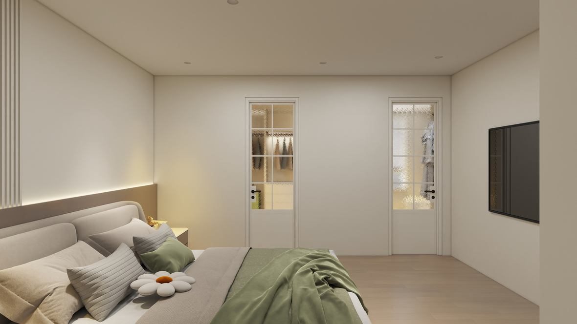 Master bedroom with ensuite and closet doors